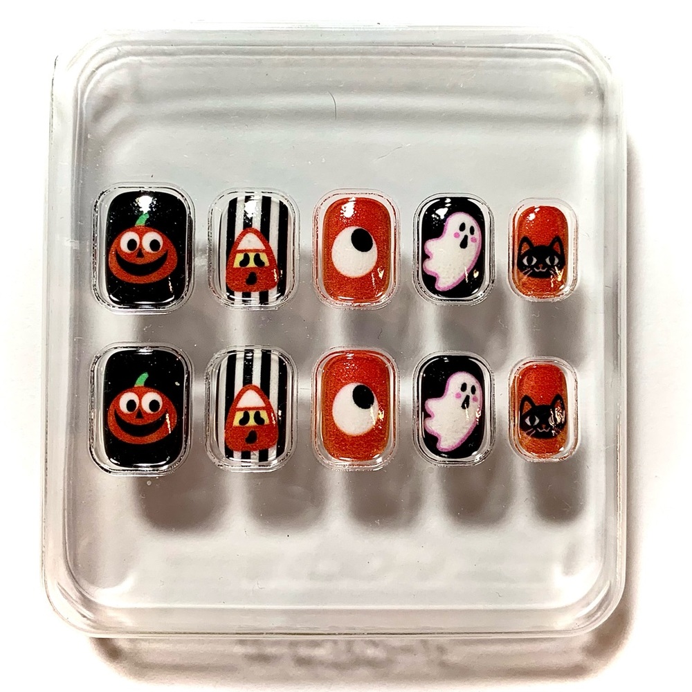 Press on Halloween nails. Very cute. No adhesive.